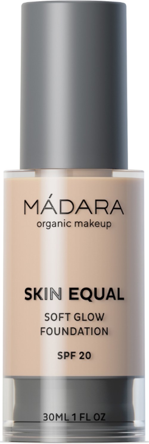A bottle of Madara organic makeup foundation, labeled 'Skin Equal Soft Glow Foundation SPF 20,' 30ml.