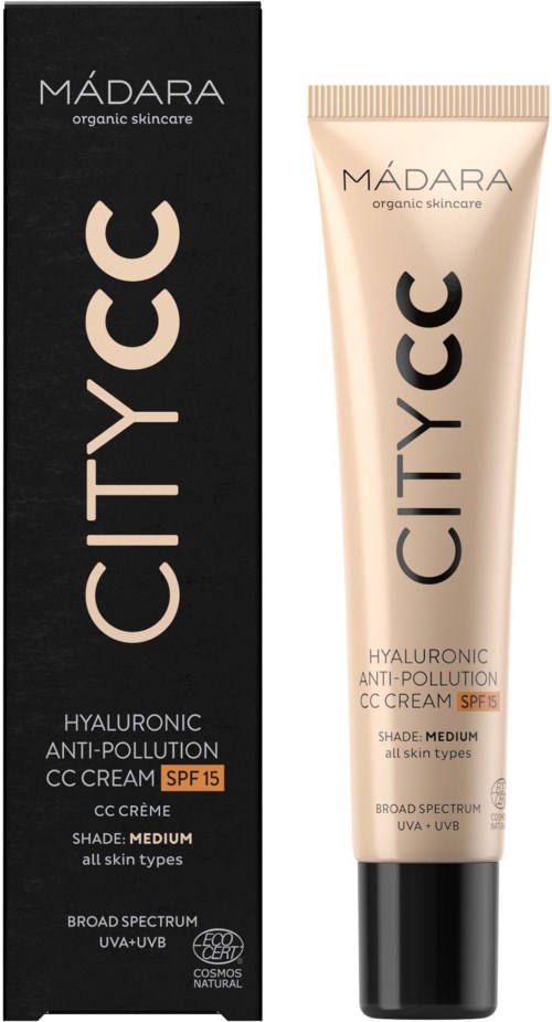 A tube of Mádara City CC cream with SPF 15, in beige, stands beside its black box with white and beige text.