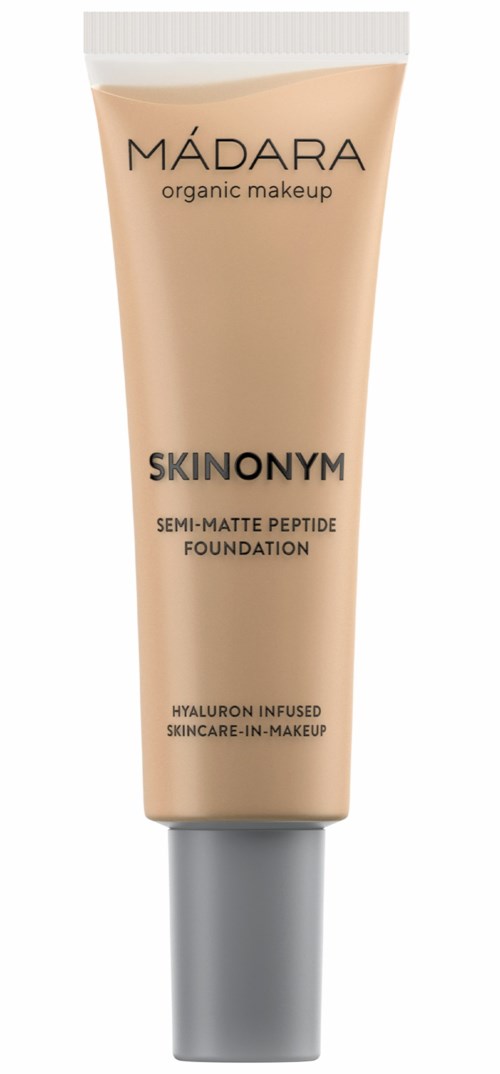 A beige tube of Madara skincare makeup with gray cap, labeled as Skinonym foundation with peptides and hyaluron.