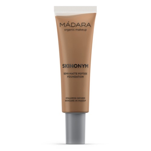 A tube of foundation labeled 'MADARA' with 'semi-matte' and 'hyaluron' written on it.