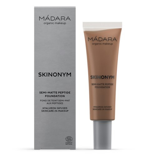 A tube and box of Mádara semi-matte peptide foundation for organic makeup. The tube is beige with black and white text.