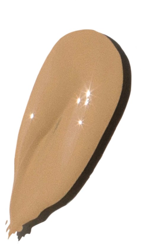 A beige liquid foundation drop with a shiny surface and a dark shadow on the right side.