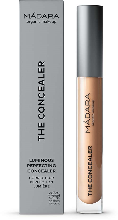 A tube of Madara concealer next to its box, labeled 'The Concealer' and 'Luminous Perfecting Concealer.'