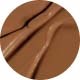 Dark brown background with several thin, light brown lines running across in different directions.