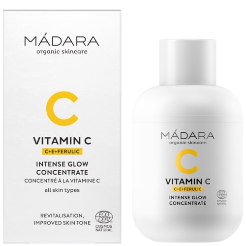 A white box and bottle for Mádara Vitamin C skincare, highlighting brightening and revitalizing skin benefits.