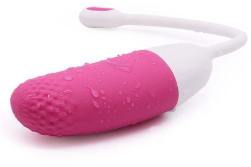 Ein pink-weißer Silikonvibrator mit Wassertropfen, gebogener Form und kleiner Fernbedienung.