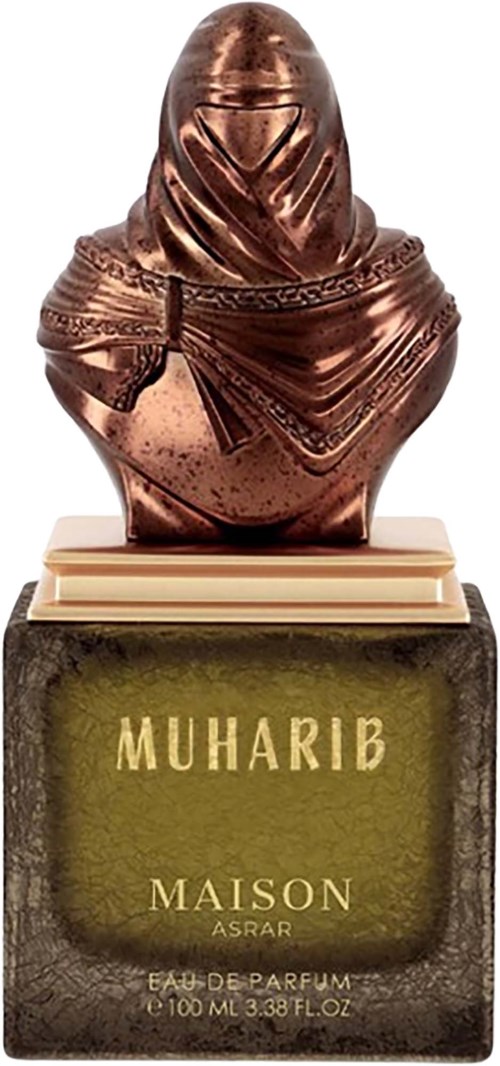 A bronze sculpture of a veiled woman on a perfume bottle labeled "MUHARIB MAISON ASRAR."
