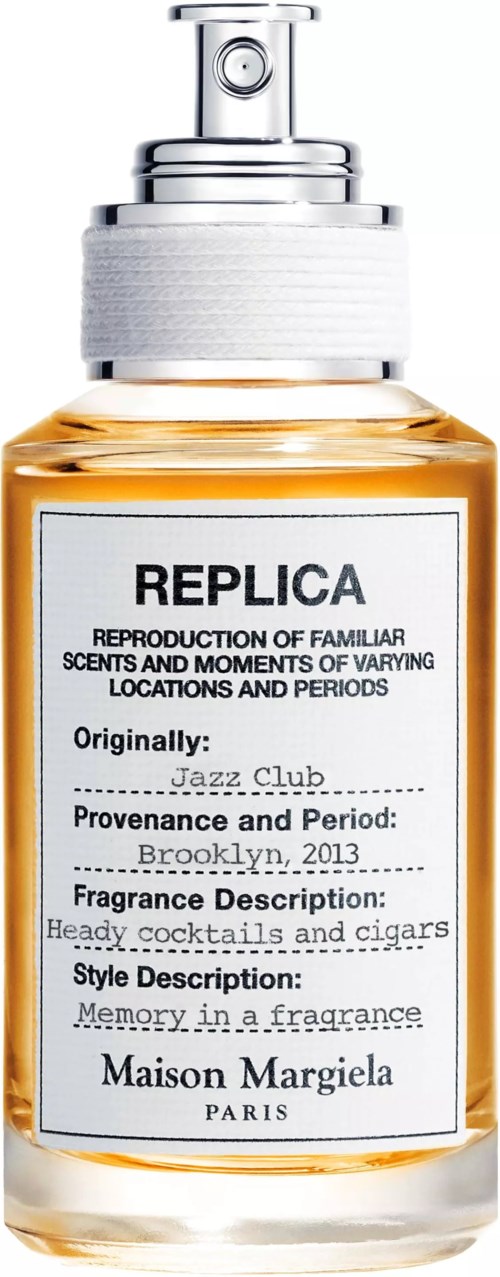 Ein Parfümflasche mit dem Label Replica, enthält Details zur Duft, Herkunft und Marke, Maison Margiela Paris.