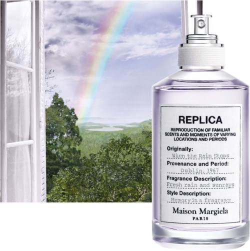 Ein Fenster zeigt einen Regenbogen draußen mit Grün und Himmel, neben einer Parfümflasche von Maison Margiela.