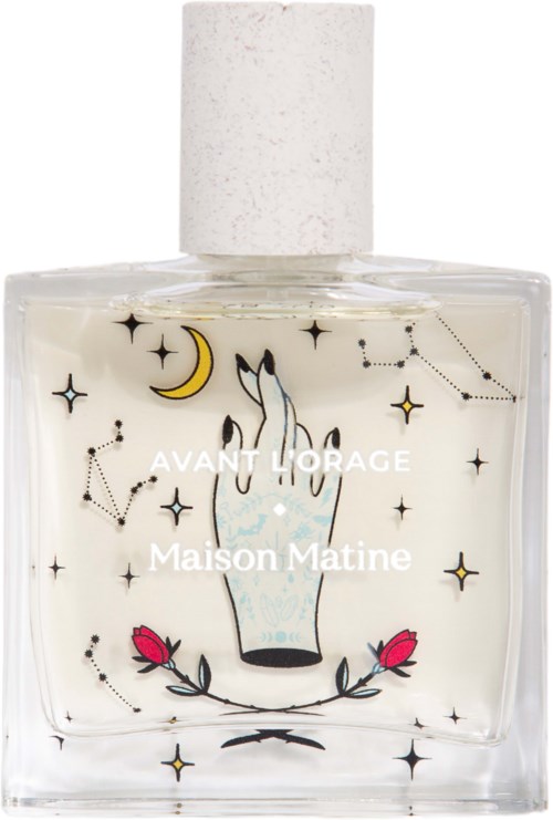 A perfume bottle with celestial design, featuring stars, a moon, and a hand with a floral tattoo.