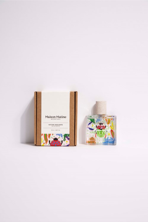 A boxed product with a colorful label, a transparent bottle with a spray, and a rectangular box on a white background.