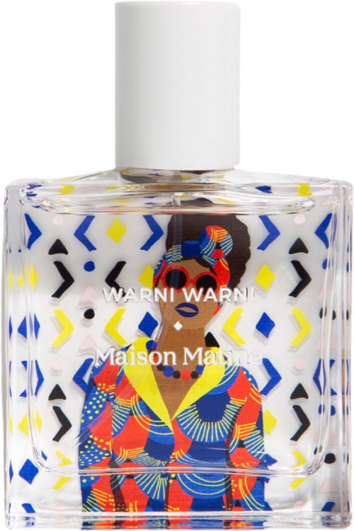 A colorful perfume bottle featuring a stylized woman, with blue, red, yellow, and black patterns, and a white cap.