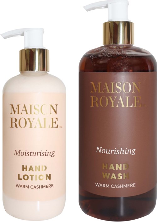 Two lotion bottles, one white and one brown, labeled 'Hand Lotion' and 'Hand Wash' with gold accents.
