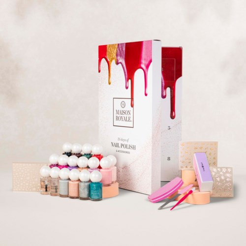 Nail polish set with eight bottles in front of a box, paired with pink tools and pastel boxes.
