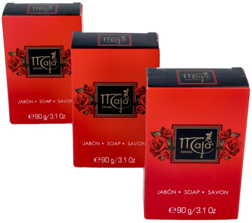 Three red boxes of soap with black and gold labels, decorated with red roses, arranged in a row.