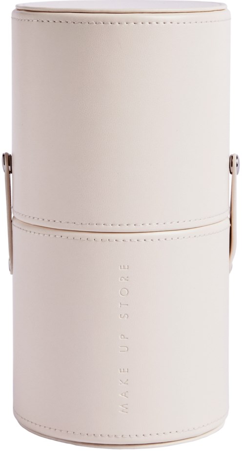 A white cylindrical container with the words "MADE UP STORE" embossed on it.