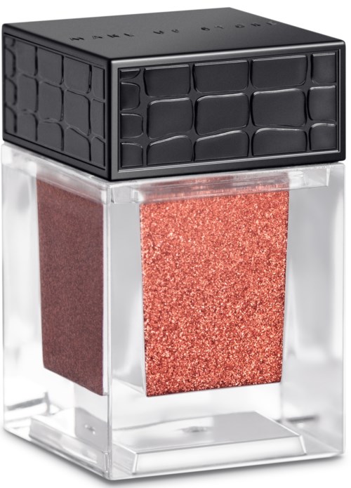 En liten makeup-kompakt med svart lock och rosa-röd glitterrouge inuti. Klart plastbehållare.