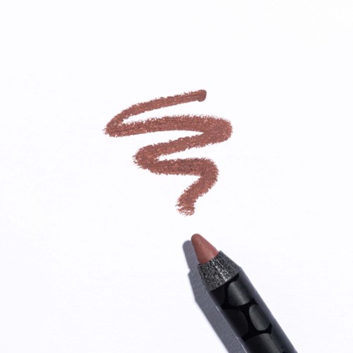 Een lippenstift markeert het einde van een bruine zigzaglijn op wit papier.