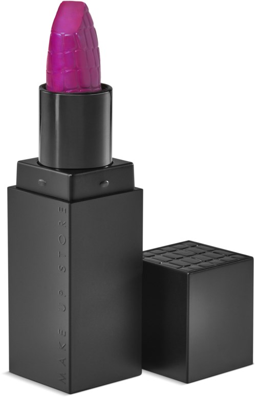 Ett kraftigt rosa läppstift i en svart tub, med en separat svart lock liggande i närheten.