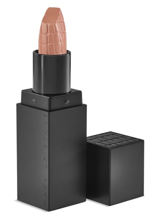 Läppstift formad som ett finger i ett svart fodral, med en strukturerad, hudfärgad design.