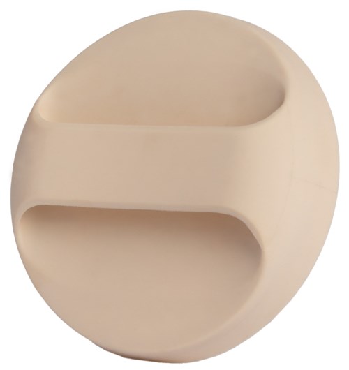 A beige round object with two curved, shallow compartments. It looks like a small container or holder.