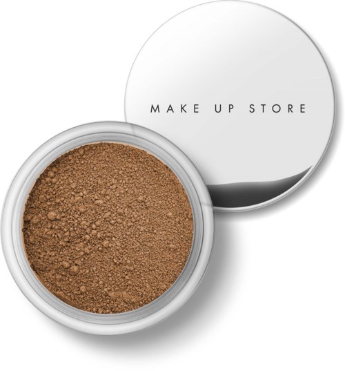 A round container with brown powder and a lid that says 'MAKE UP STORE'.