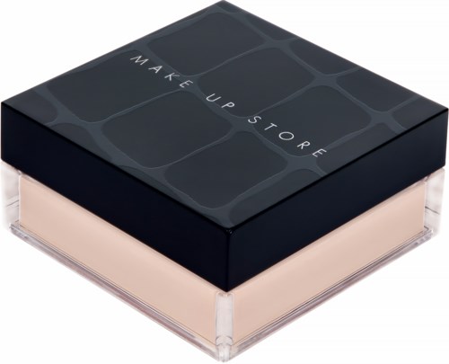 En svart fyrkantig makeup-aska med ett klart bas och ljusfärgade innehåll inuti.