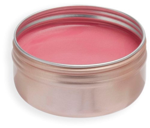 Pyöreä, avoin metallipurkki täynnä pinkkiä pastaa tai rasvaa, sileä pinta. Se näyttää kosmetiikkatuotteelta.