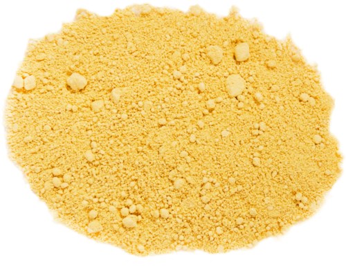 Yellow powder with small clumps scattered around. Looks like a finely ground substance.