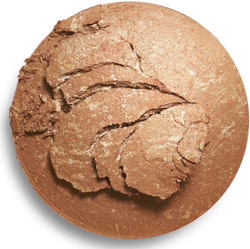 A round makeup compact is shown, opened to reveal pressed powder inside.
