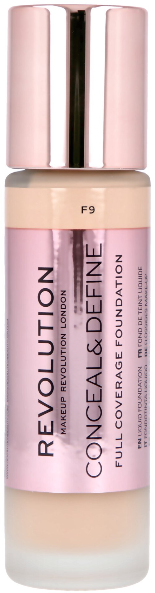 A bottle of Revolution Conceal & Define foundation with a pink and silver cap, labeled for full coverage.