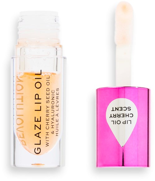 Lippenbalsem container met een roze doos en een applicatorstokje ernaast.