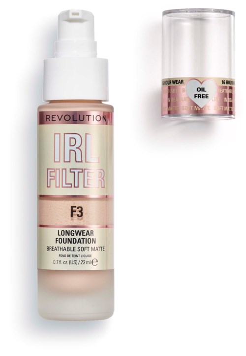 En flaska Revolution IRL Filter F3 longwear foundation med lock i närheten, ljus rosa och vitt med text.