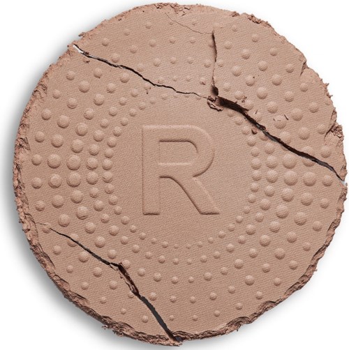 Een ronde, gebarsten oppervlakte met stippen en een grote letter 'R' in het midden.