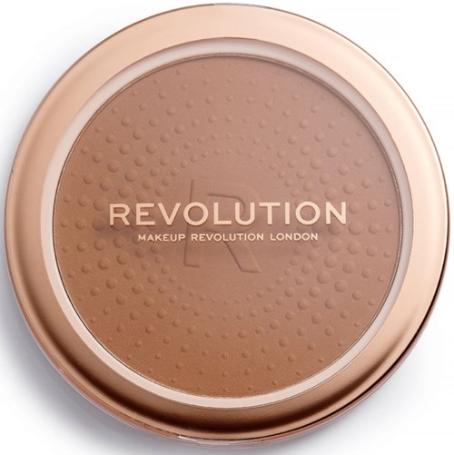 A round compact with a beige powder and text: 'REVOLUTION MAKEUP REVOLUTION LONDON'.