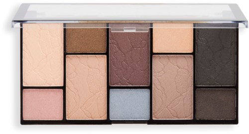 A makeup palette with various shades of blush, eyeshadow, and highlighter, some with cracked surfaces.