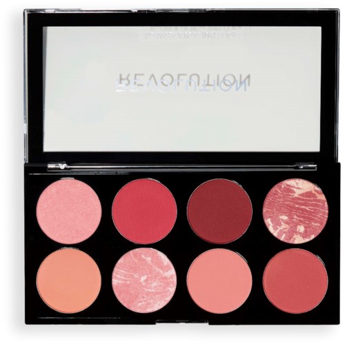 Make-up palette met acht roze en rode tinten, sommige met marmering of matte afwerking.