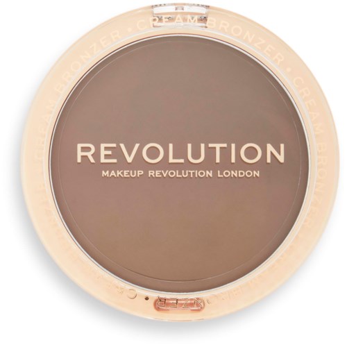 Een ronde make-upproduct met 'REVOLUTION' en extra tekst 'MAKEUP REVOLUTION LONDON'.