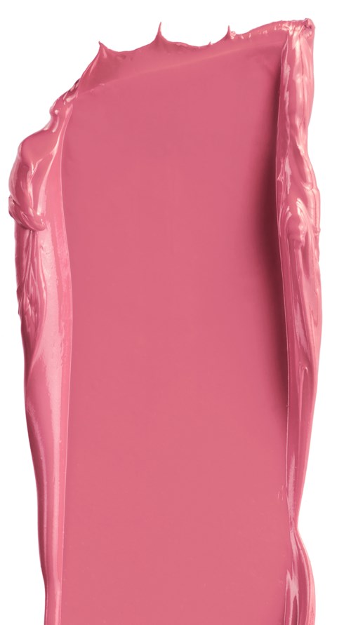 Ett rosa, glansigt, rektangulärt föremål med oregelbundna kanter och glansig yta.