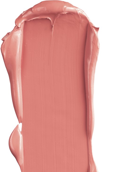 En rosaaktig beige krämig substans spridd i ett tjockt, ojämnt lager på en vit bakgrund.