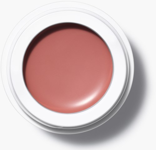 Ett runt rosa makeup-produkt i ett vitt cirkulärt fodral med skugga på högra sidan.