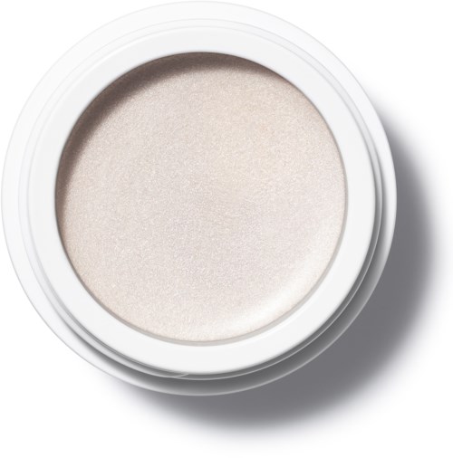 En rund behållare med ljusfärgat puder, kanske makeup eller hudvårdsprodukt, inuti den.