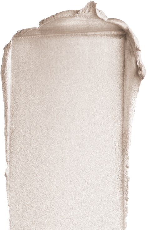 En stor, mest tom yta med textur i beige eller krämfärg, med ojämna kanter och ojämn tjocklek.