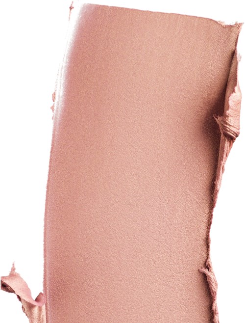 Ett trasigt rosa makeup- eller rougeprov med ojämna kanter och slät yta.