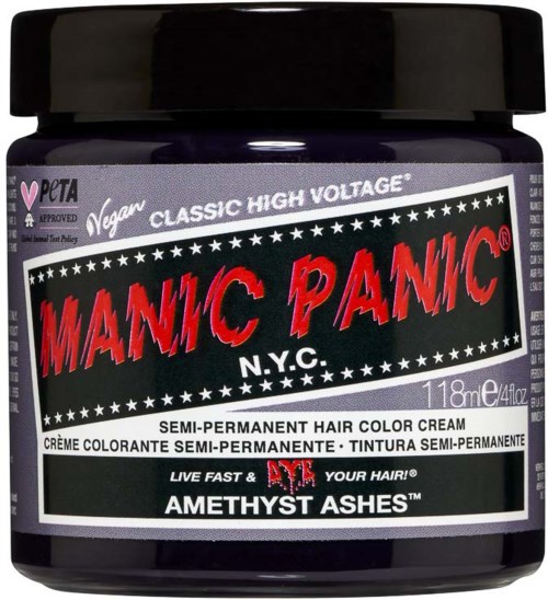 A jar of semi-permanent hair color cream called MANIC PANIC with a black lid, vibrant label, and stars design.