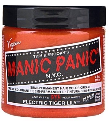 A jar of semi-permanent orange hair color labeled "Manic Panic" with black lid and notes about vegan product and bright hair.