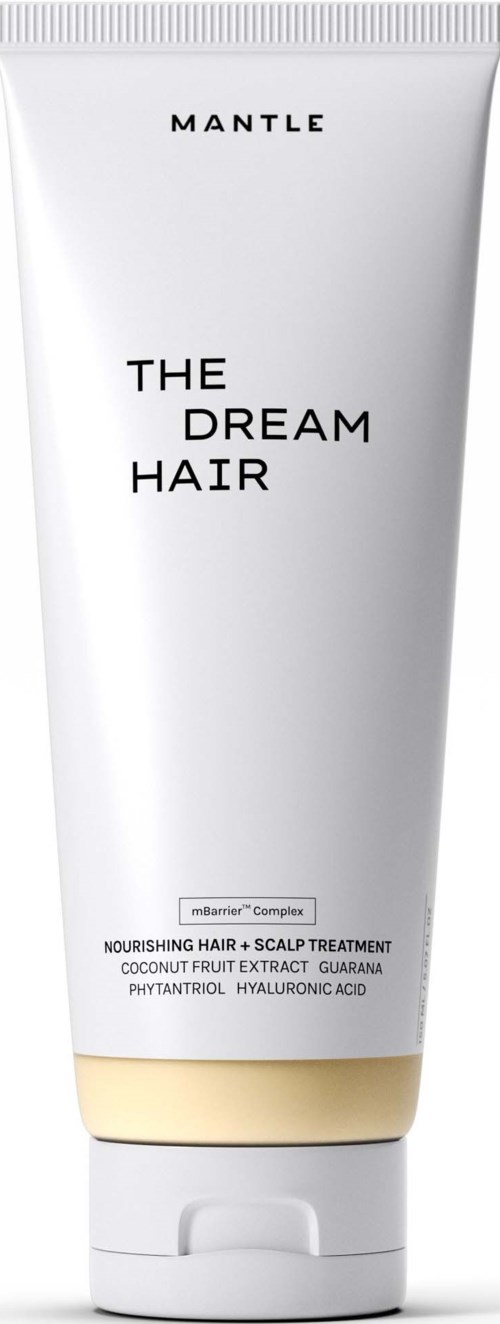 Vit tube med svart och guldtext, med titeln 'The Dream Hair' av Mantle, för närande hår- och hårbottenbehandling.