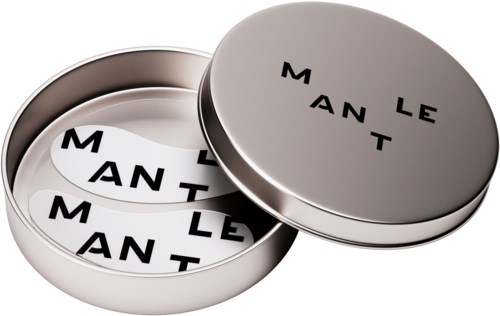 Ein runder Metallbehälter mit den Worten Le Man auf dem Deckel und innen. Die Wörter sind aufgeteilt und angeordnet.