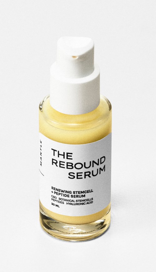 En liten flaska serum märkt "The Rebound Serum" med en vit pump.
