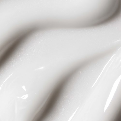 Nahaufnahme von weißer, glänzender Farbe mit glatter Textur und glänzendem Finish.
